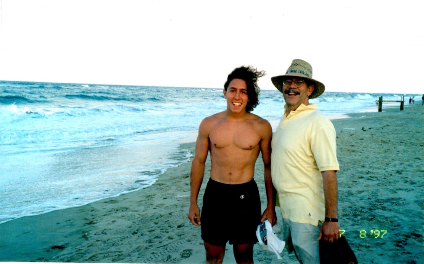Paul and his dad at the beach, 1997